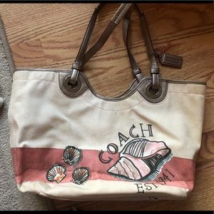 Authentic coach purse with shell design and pouch